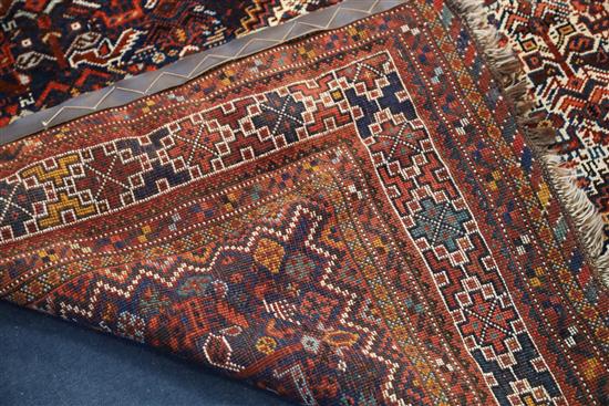 A Qashgai blue ground rug, 7ft 2in by 5ft 5in.